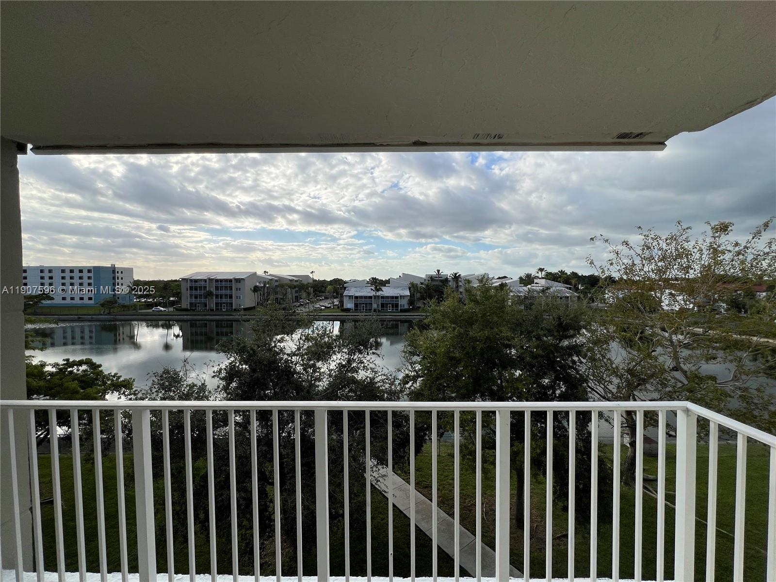 8260 Southwest 210th Street, Unit 302 Cutler Bay, FL 33189 - Photo 7 of 42 a view of a balcony with city view