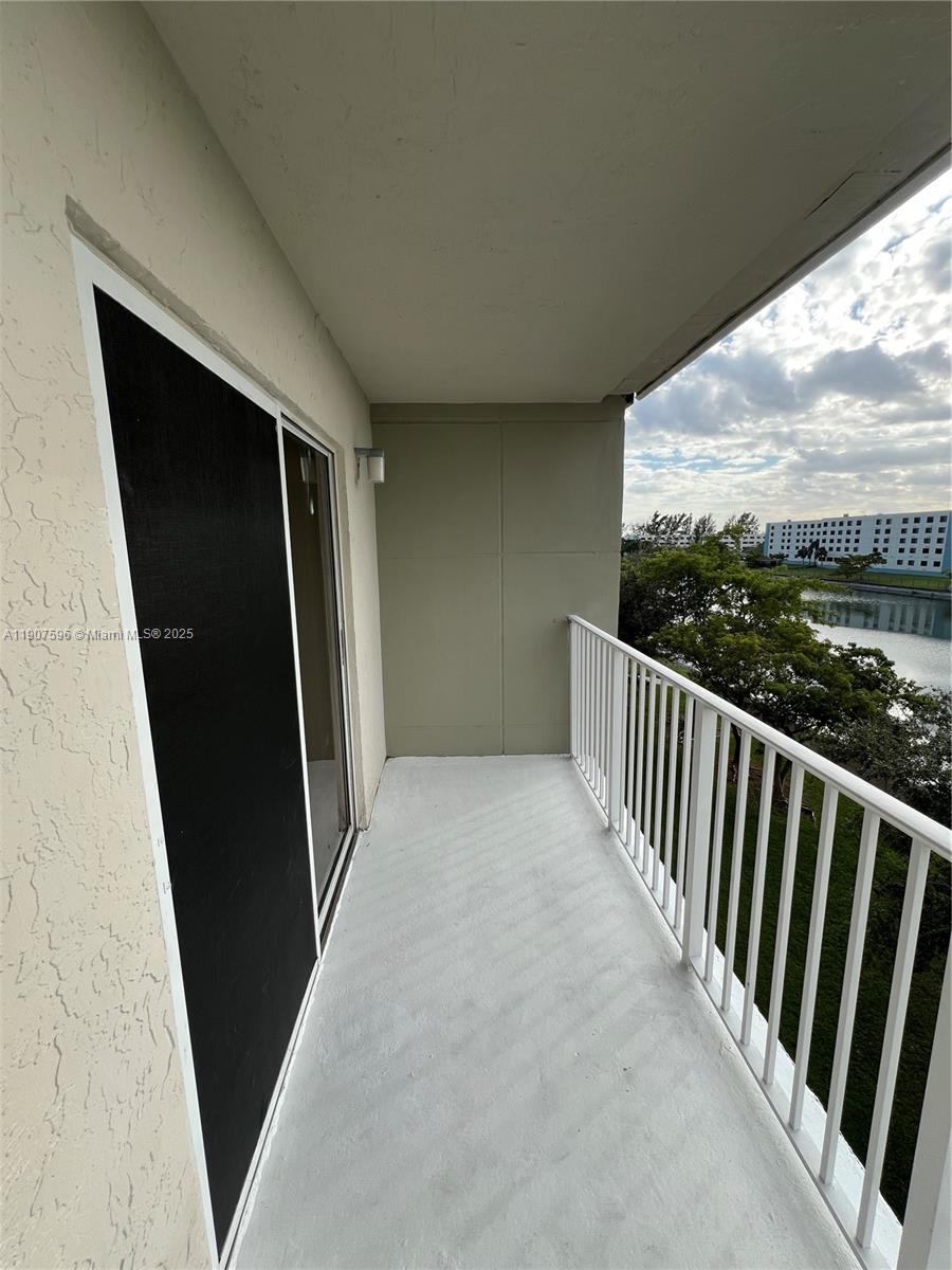 8260 Southwest 210th Street, Unit 302 Cutler Bay, FL 33189 - Photo 9 of 42 a view of balcony