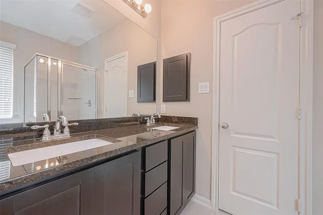 a bathroom with a tub and a shower