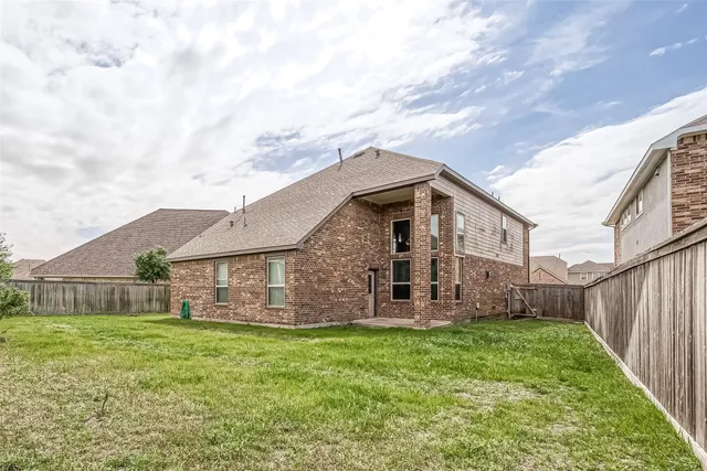 a view of a garden with a small yard