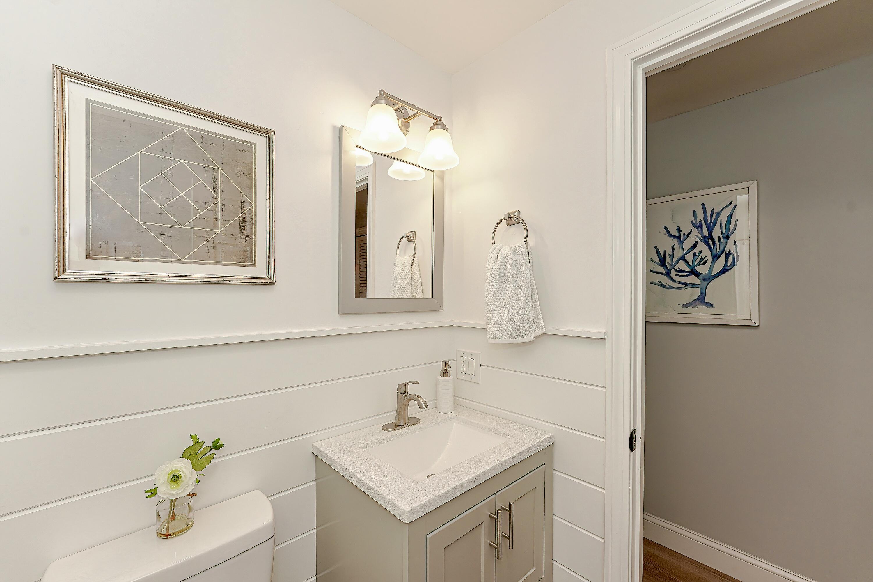 164 Katherine Road Centerville, MA 02632 - Photo 27 of 47 a bathroom with a sink vanity and a mirror