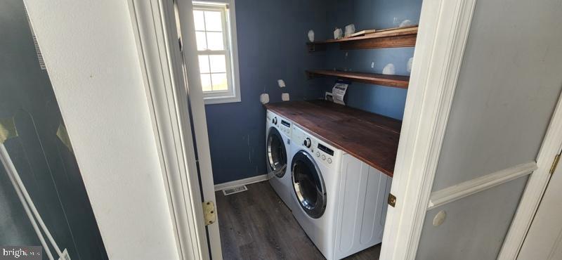 351 Thumper Drive Ranson, WV 25438 - Photo 16 of 45 Charming laundry nook with modern flair.