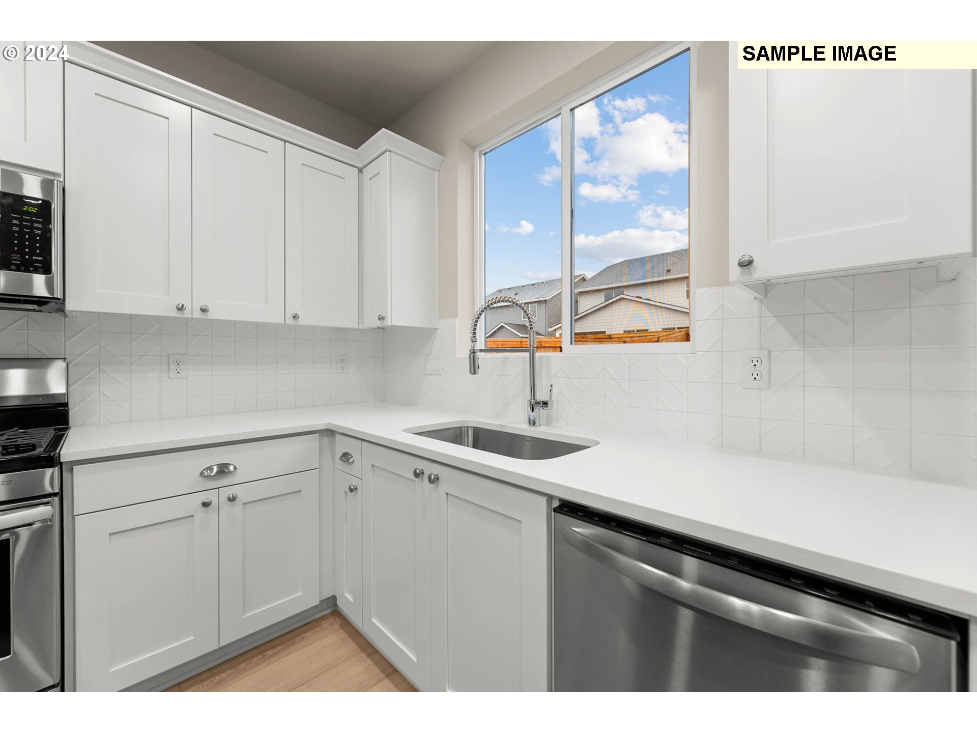 3135 South Nectarine Street Cornelius, OR 97113 - Photo 18 of 41 a kitchen with a sink and cabinets