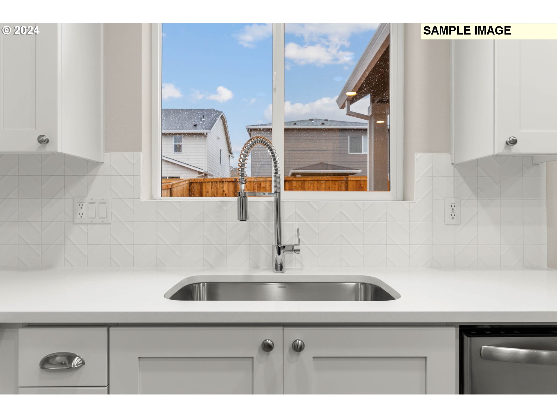 3135 South Nectarine Street Cornelius, OR 97113 - Photo 19 of 41 a kitchen with a sink and a refrigerator