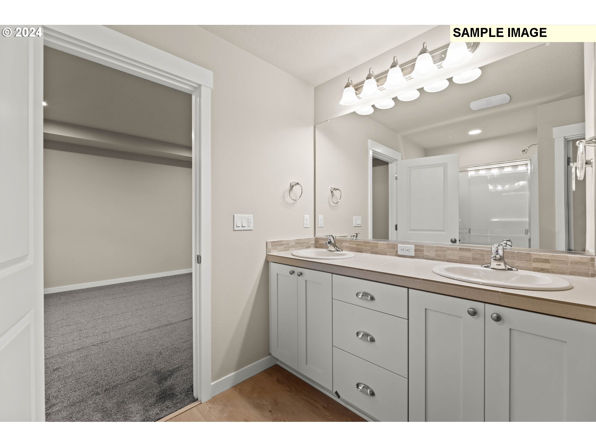 3135 South Nectarine Street Cornelius, OR 97113 - Photo 31 of 41 a bathroom with a double vanity sink and a mirror