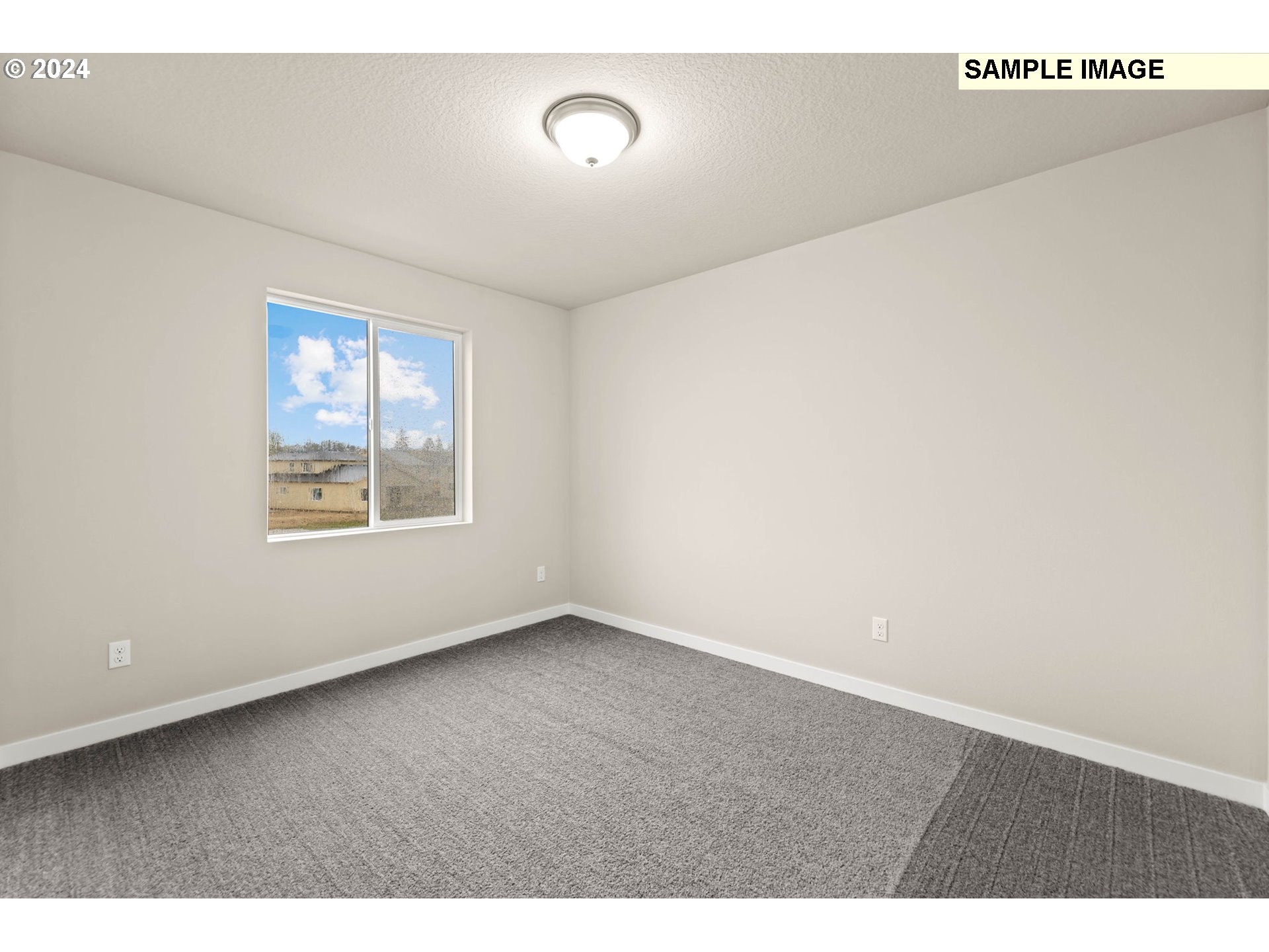 3135 South Nectarine Street Cornelius, OR 97113 - Photo 33 of 41 a view of an empty room with a window
