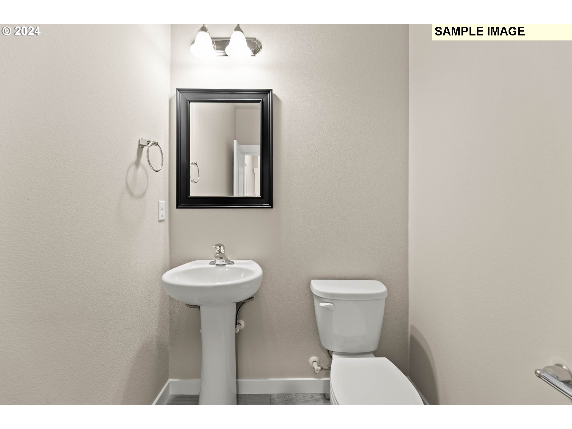 3135 South Nectarine Street Cornelius, OR 97113 - Photo 37 of 41 a bathroom with a toilet sink and mirror