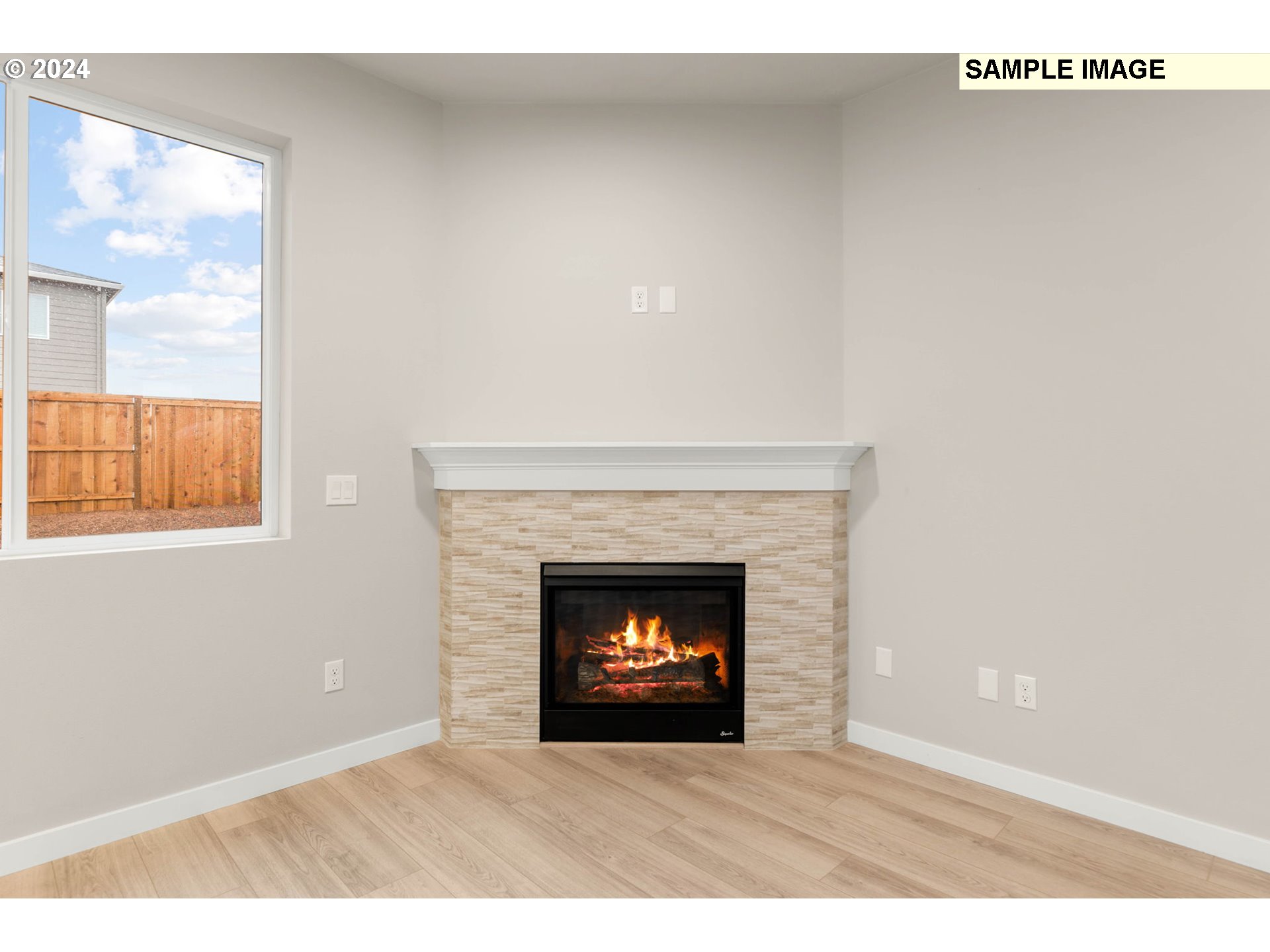 3135 South Nectarine Street Cornelius, OR 97113 - Photo 9 of 41 a black and white building with a fireplace