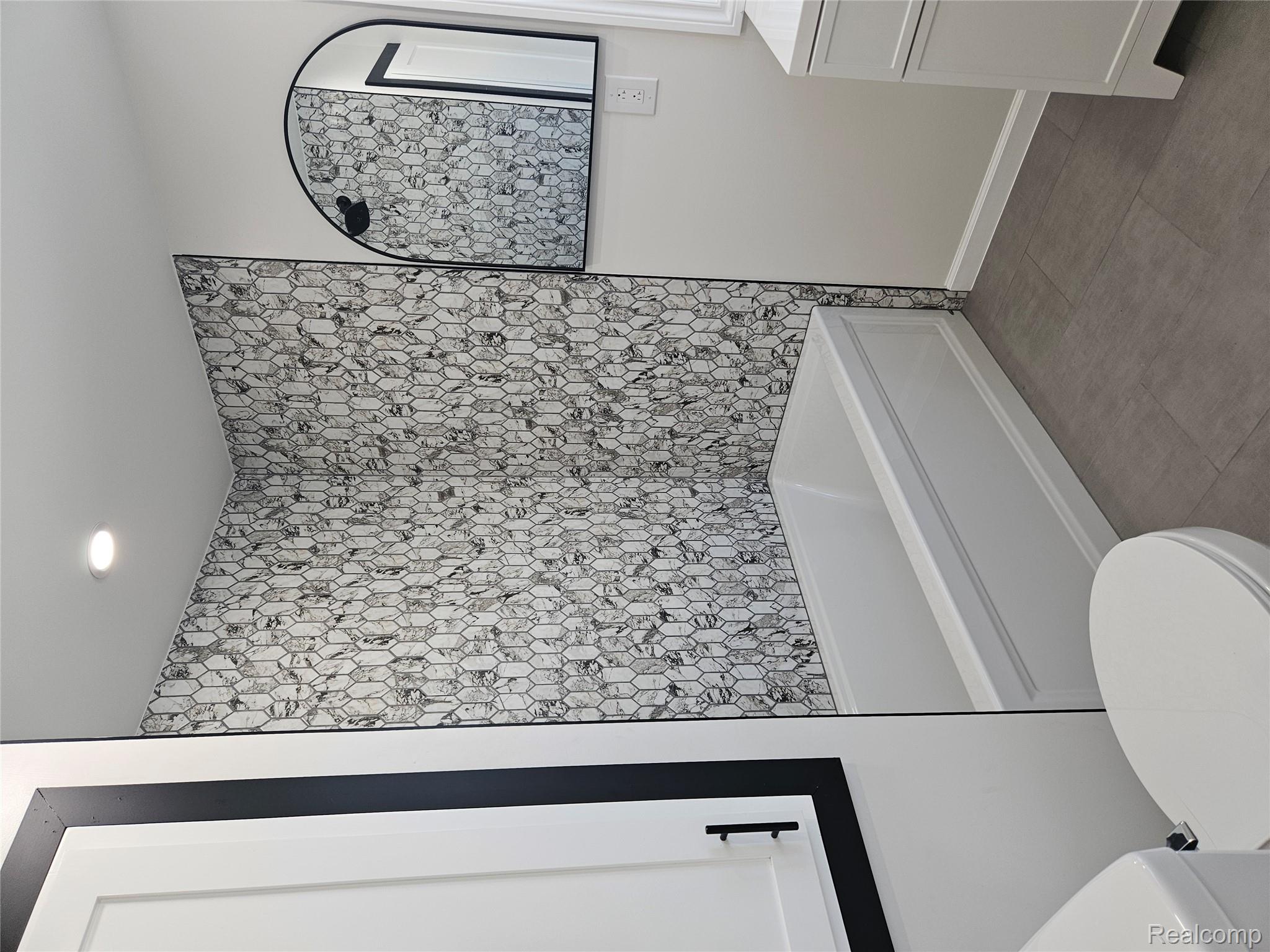 17345 Annchester Road Detroit, MI 48219 - Photo 14 of 22 Full bath featuring vanity, shower / bathtub combination, and tile patterned floors