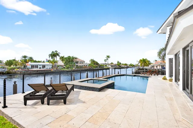 a kitchen with granite countertop a stove oven and sink
