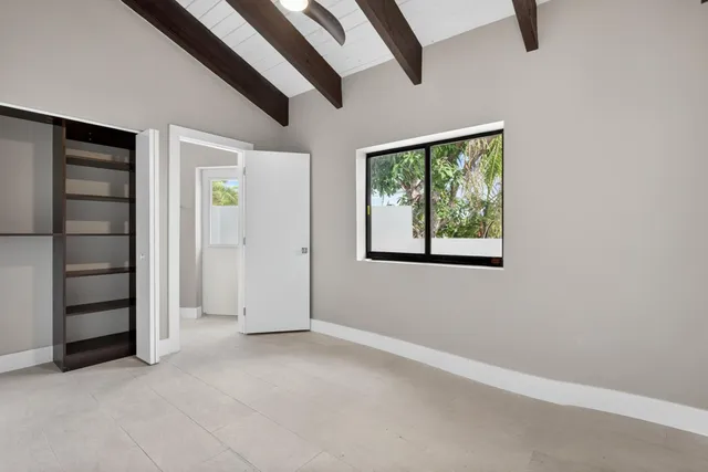 a bathroom with a sink double vanity and a mirror