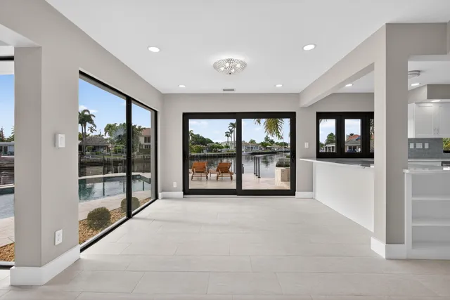 a view of a lake with houses in the back