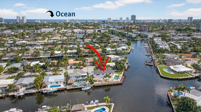 a view of outdoor kitchen and seating area