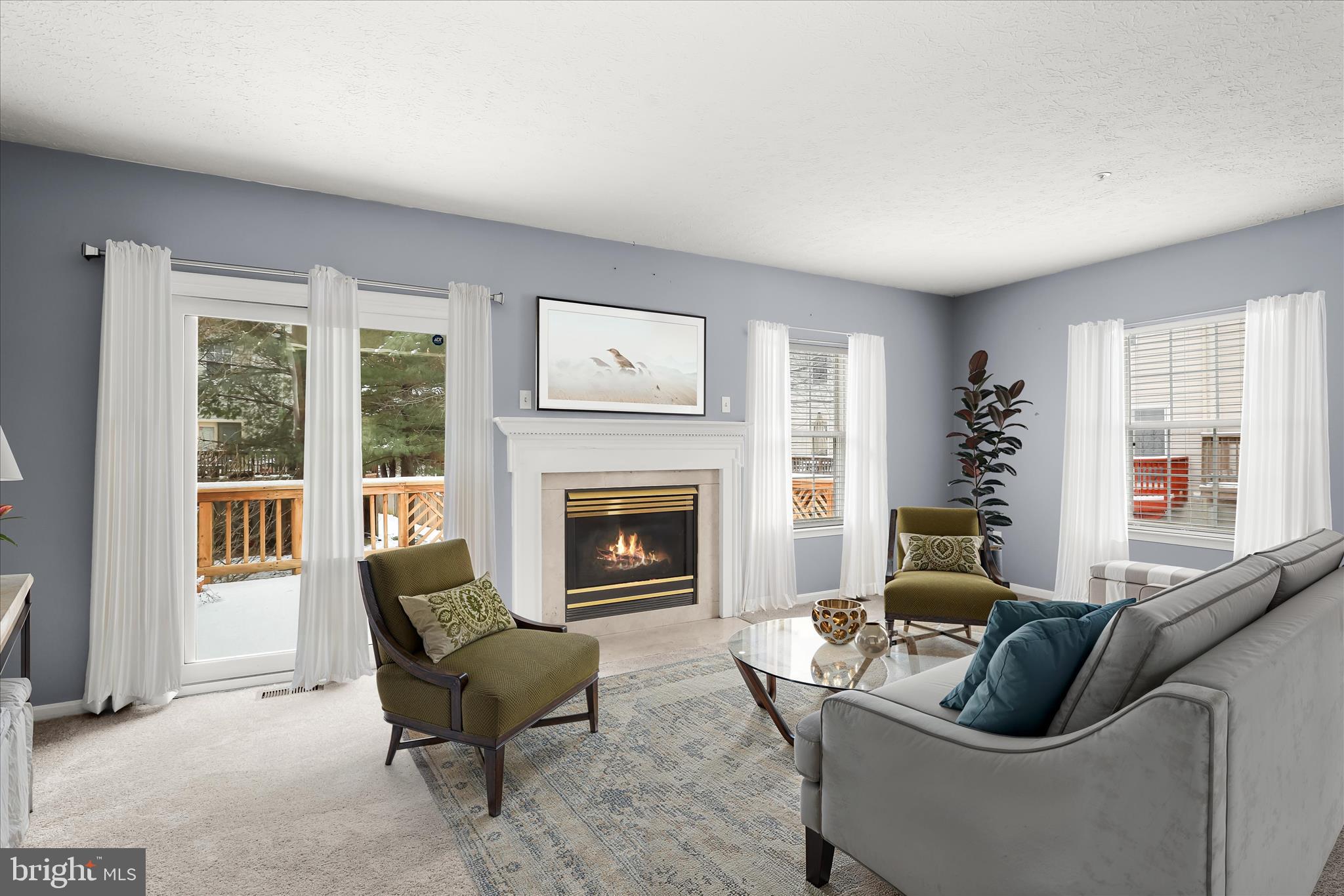 2567 Windy Oak Court Crofton, MD 21114 - Photo 2 of 52 a living room with furniture and a fireplace