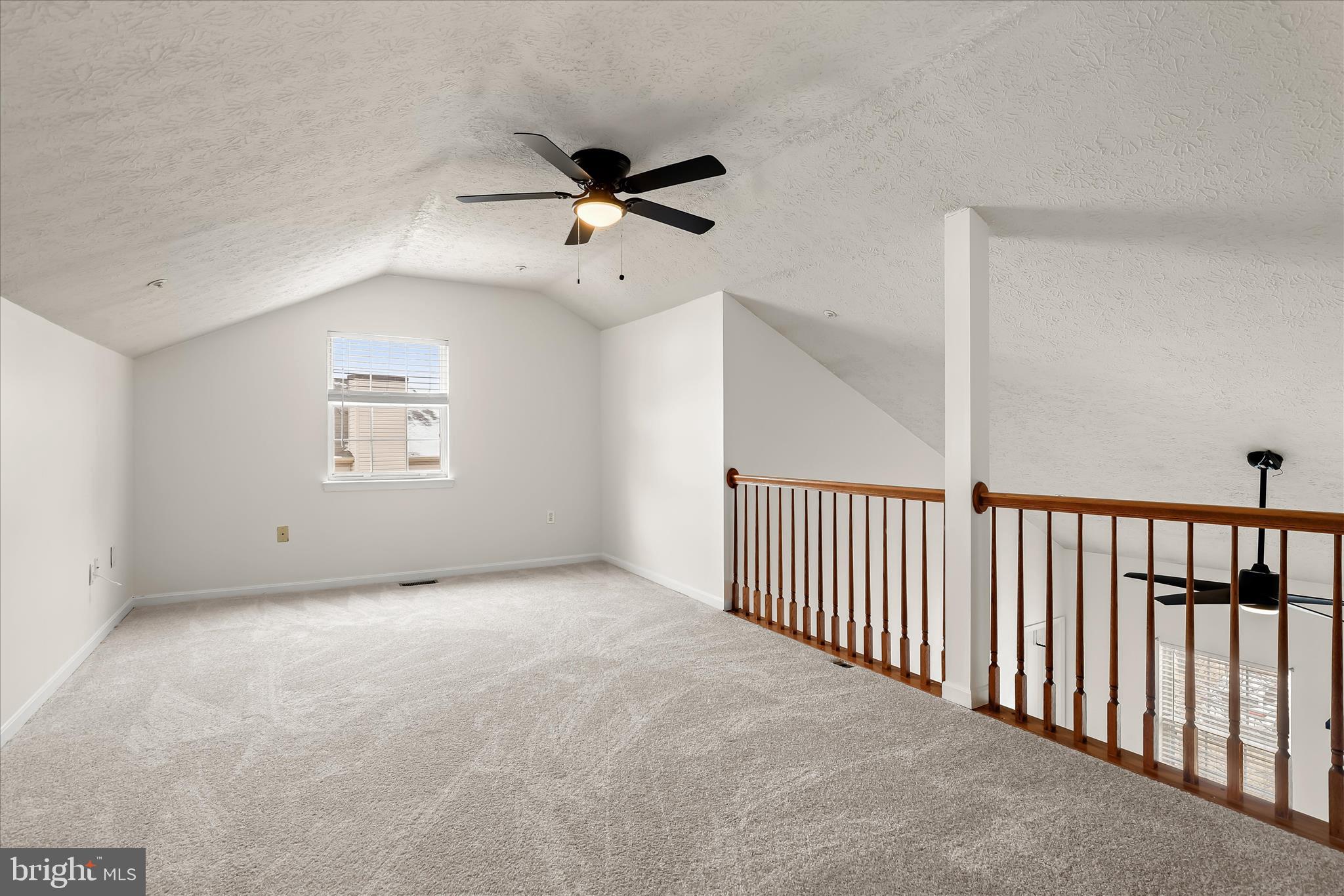 2567 Windy Oak Court Crofton, MD 21114 - Photo 21 of 52 a view of a livingroom with a ceiling fan and window