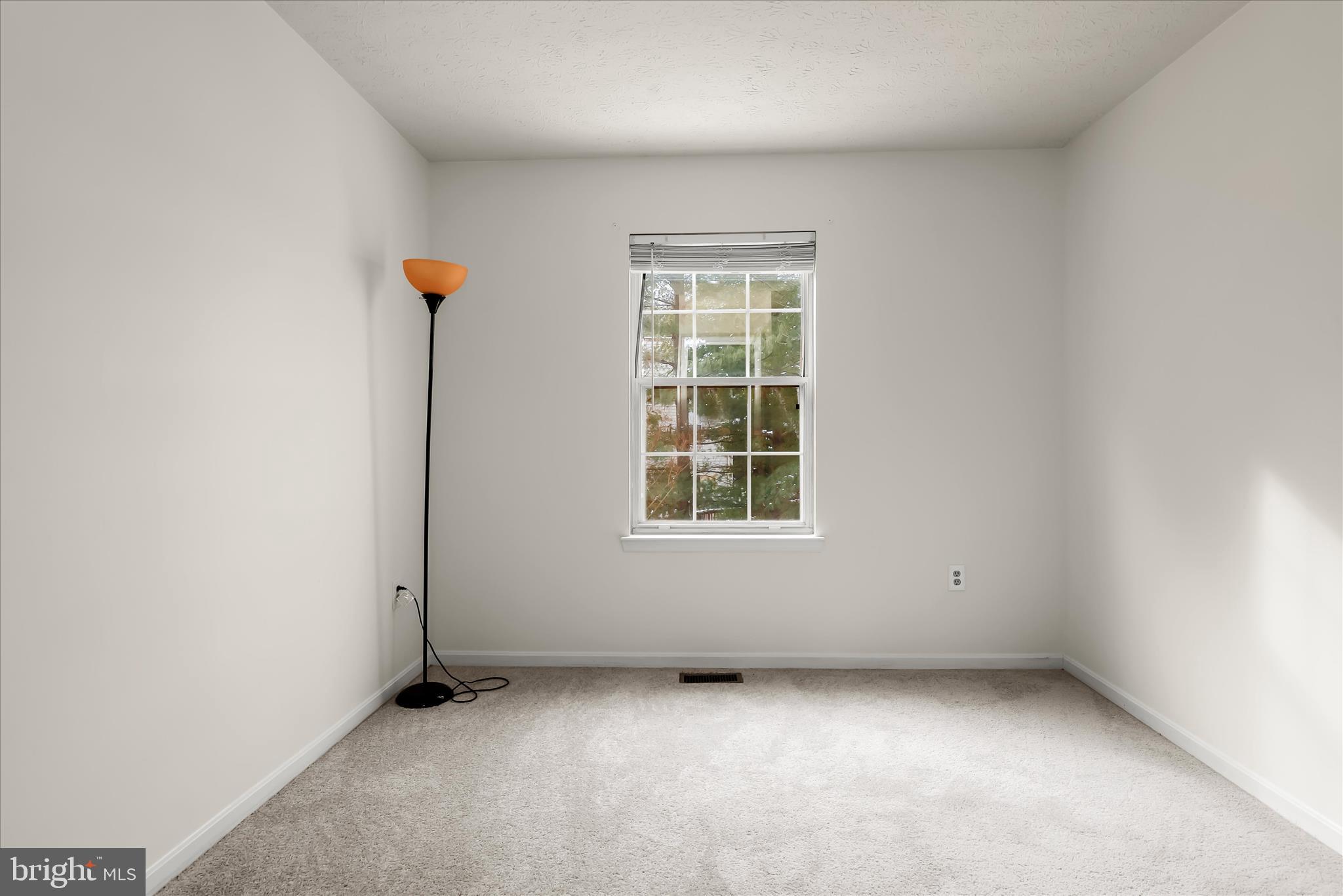 2567 Windy Oak Court Crofton, MD 21114 - Photo 24 of 52 an empty room with windows