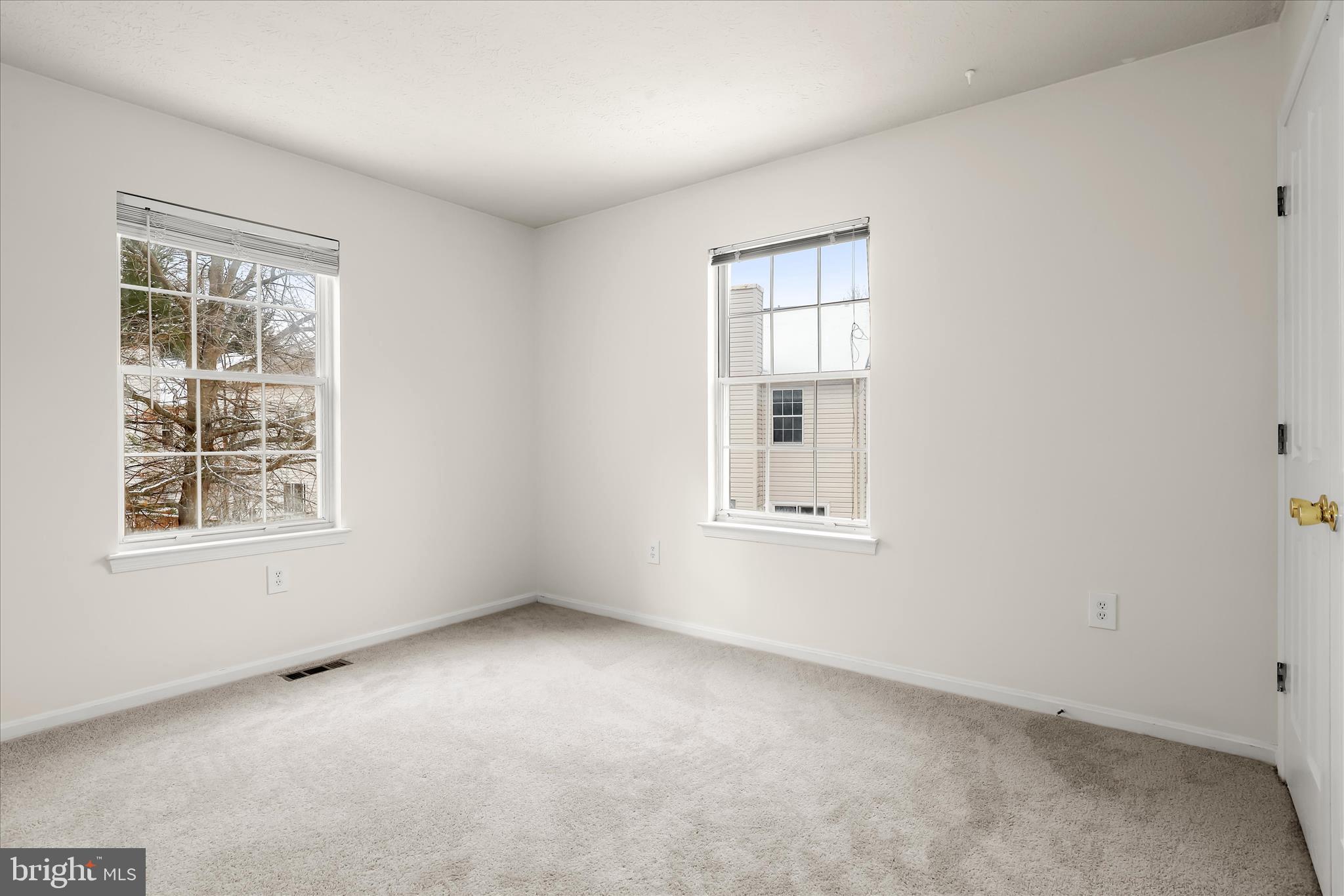 2567 Windy Oak Court Crofton, MD 21114 - Photo 27 of 52 an empty room with windows