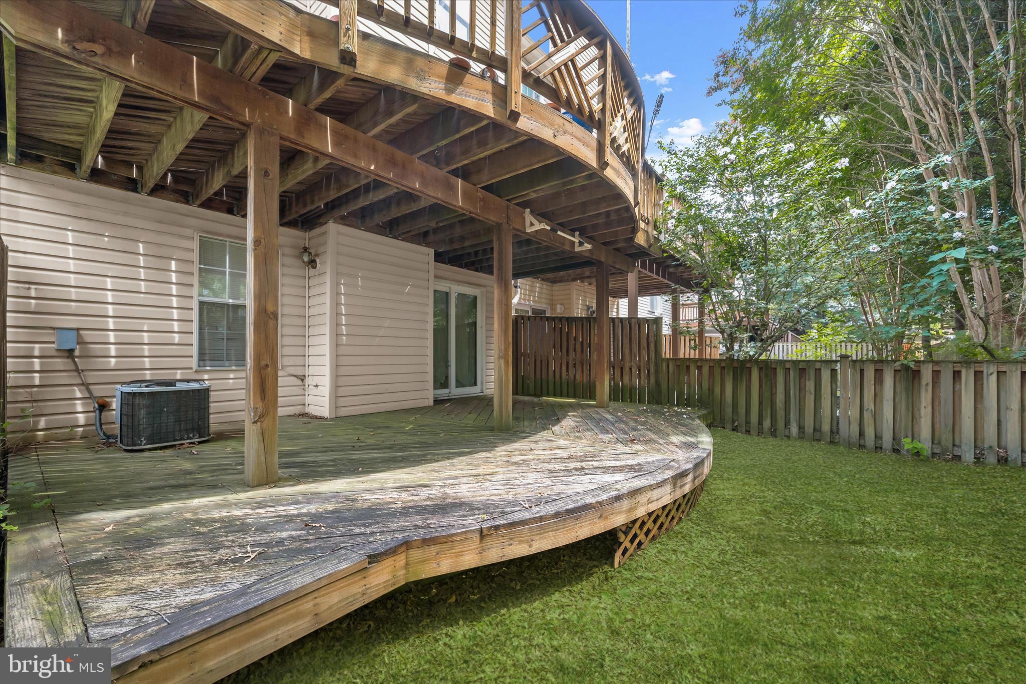 2567 Windy Oak Court Crofton, MD 21114 - Photo 44 of 52 a view of backyard with wooden fence and large trees