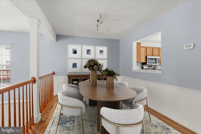 a view of a dining room with furniture