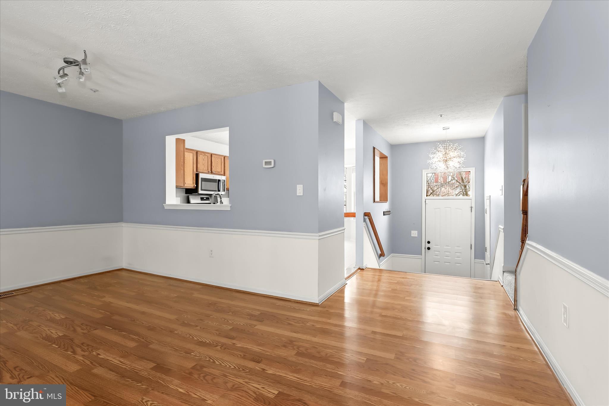 2567 Windy Oak Court Crofton, MD 21114 - Photo 8 of 52 a view of a room with wooden floor and a bathroom