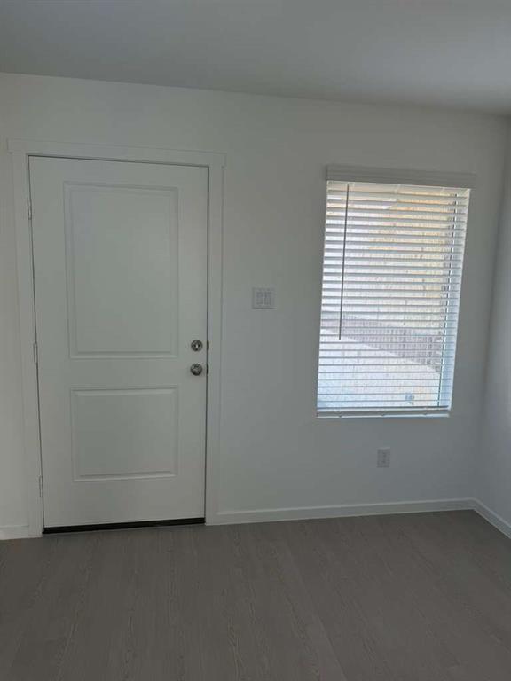 1612 Elliott Road Howe, TX 75459 - Photo 4 of 19 a view of an empty room with a window