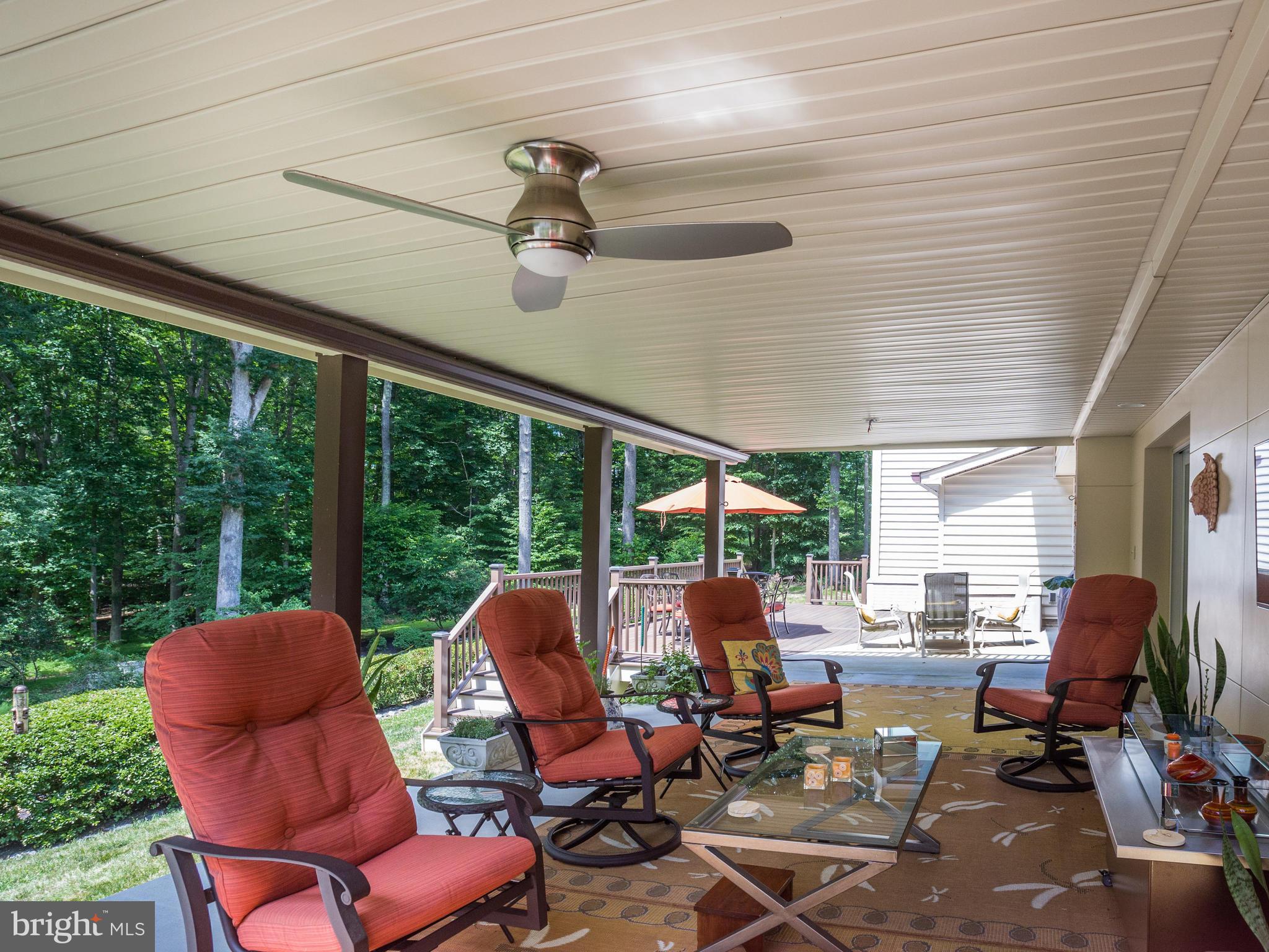 5820 Huntingtown Road Huntingtown, MD 20639 - Photo 25 of 30 Covered patio w/TV, music & fans.