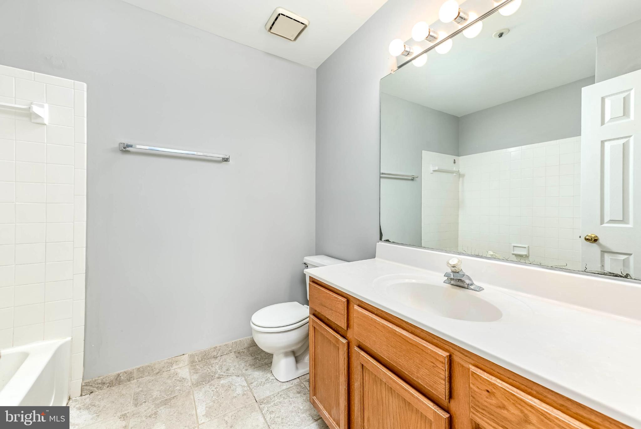 11152 Stagestone Way Manassas, VA 20109 - Photo 12 of 22 a bathroom with a sink toilet and shower