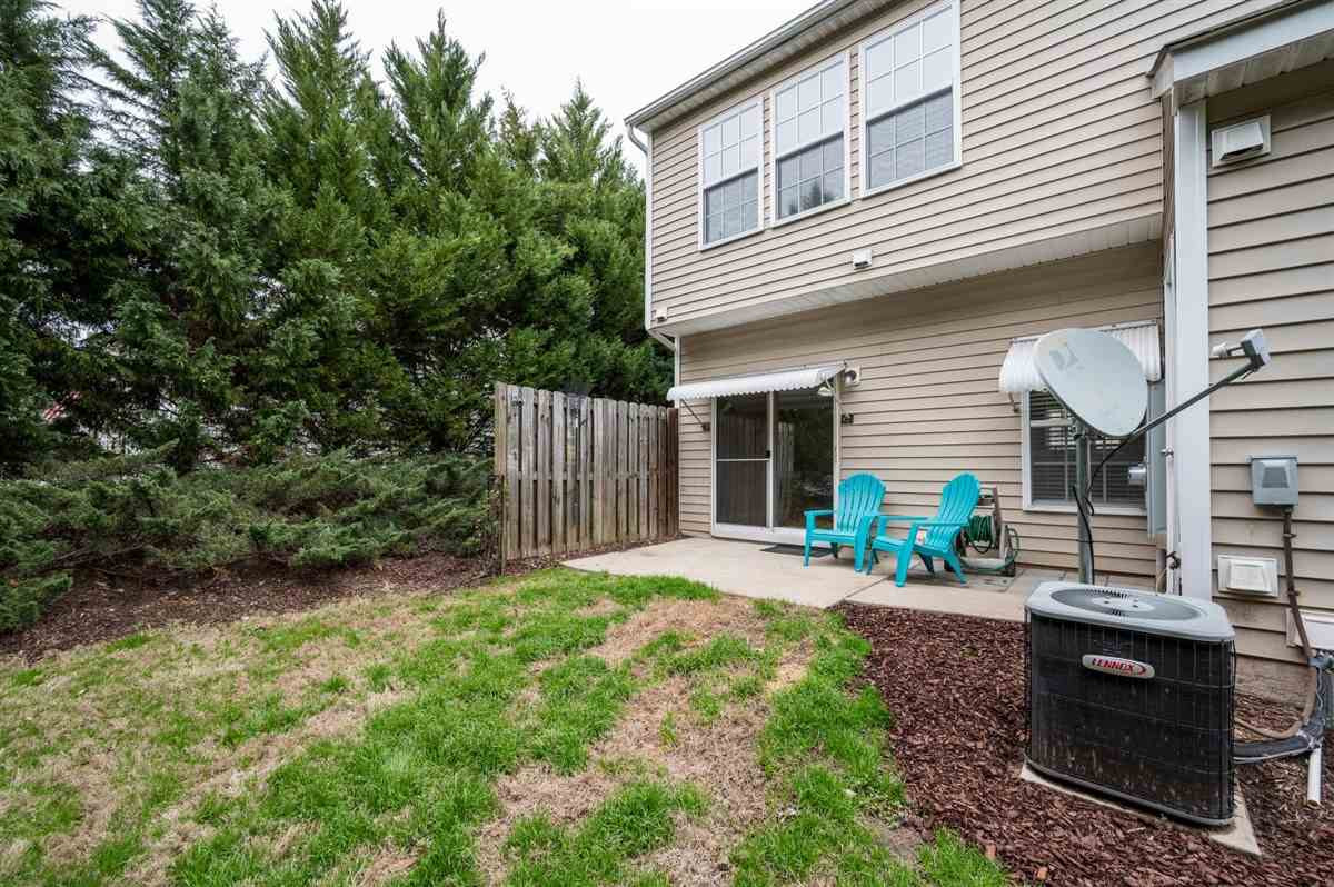 8311 Clasara Circle Raleigh, NC 27613 - Photo 25 of 27 Private, tree-lined back patio with room to relax or grill out. Storage closet for extra storage space! Patio