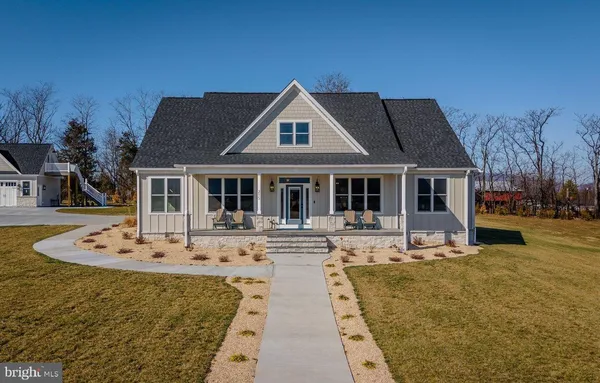 a view of a golf course with a lake