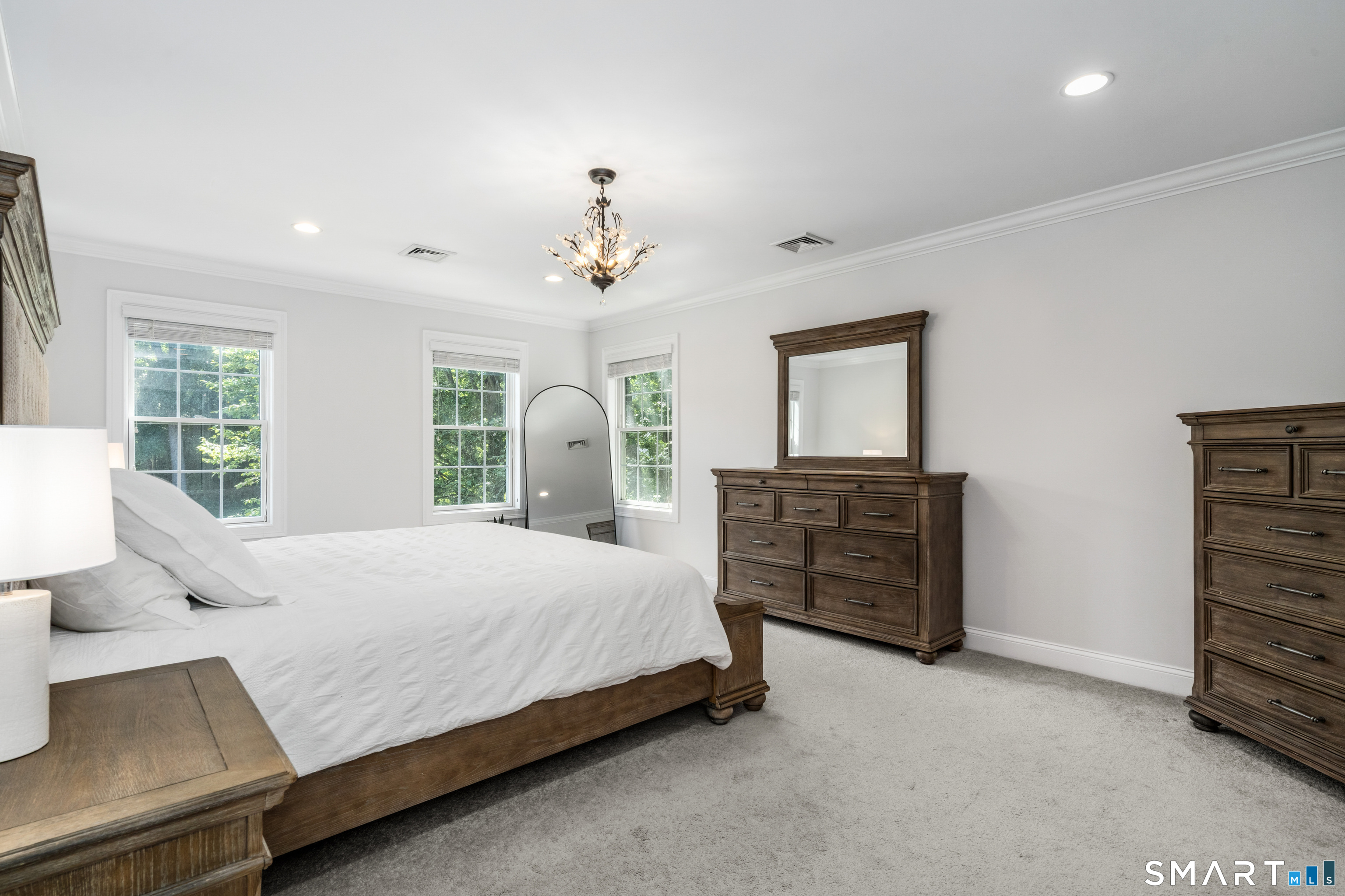 25 Hanover Fields Road Glastonbury, CT 06033 - Photo 22 of 38 spacious primary bedroom with walk in closet and ensuite bathroom