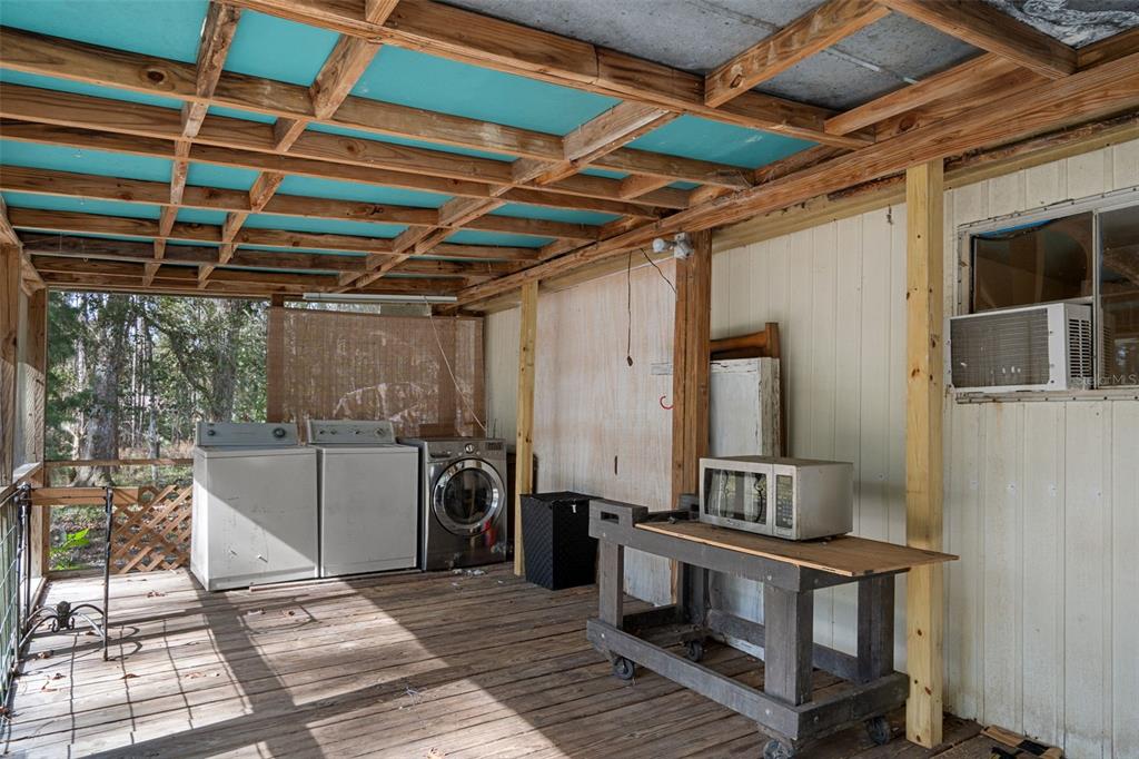 22439 Bull Run Road Brooksville, FL 34602 - Photo 11 of 66 a view of a storage & utility room
