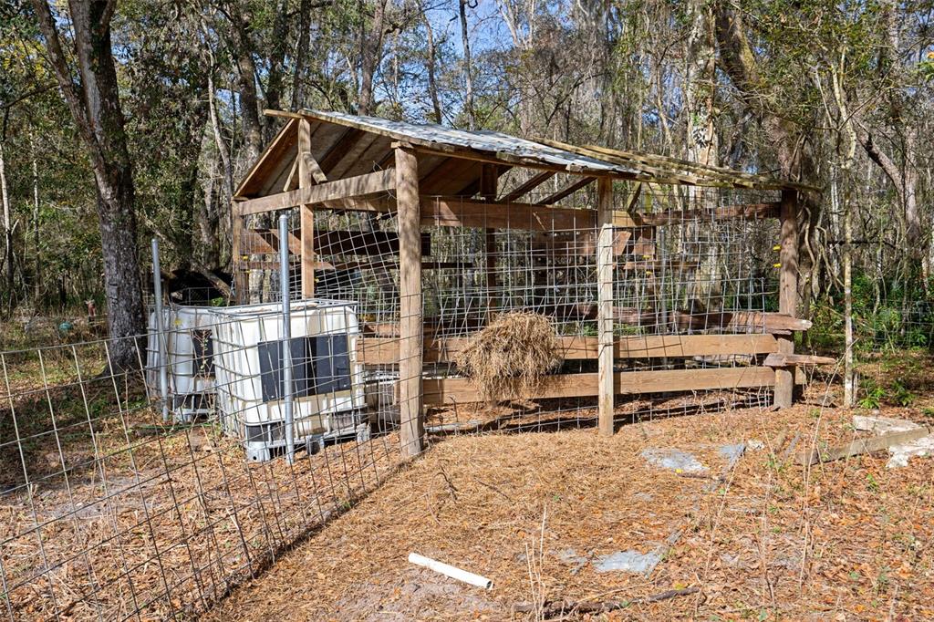 22439 Bull Run Road Brooksville, FL 34602 - Photo 30 of 66 a view of house with a outdoor space