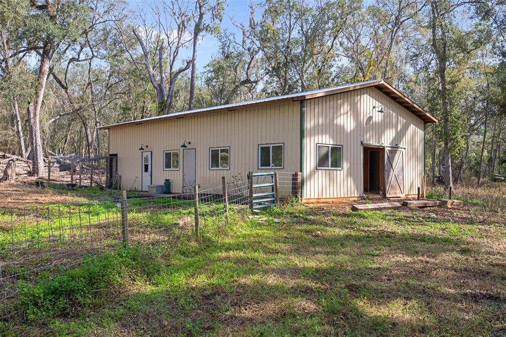 22439 Bull Run Road Brooksville, FL 34602 - Photo 39 of 66 a view of a house with backyard