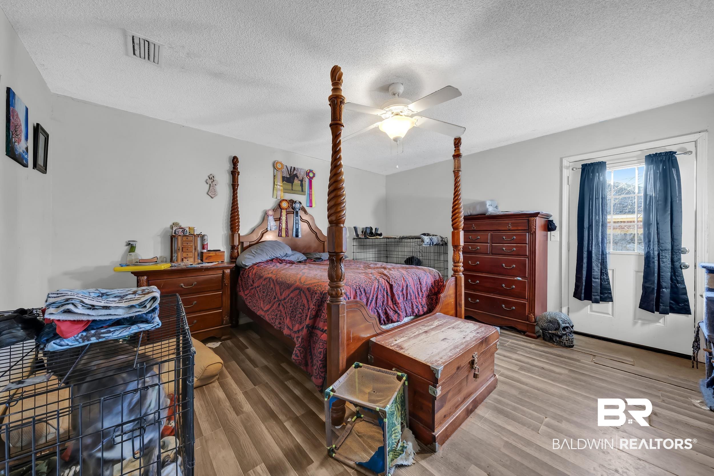16603 Vanilla Drive Foley, AL 36535 - Photo 16 of 19 Bedroom with a textured ceiling, wood finished floors, and ceiling fan