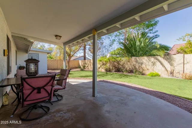 a view of a backyard with a tub