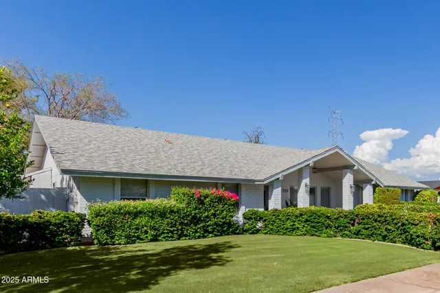 a house view with a garden space