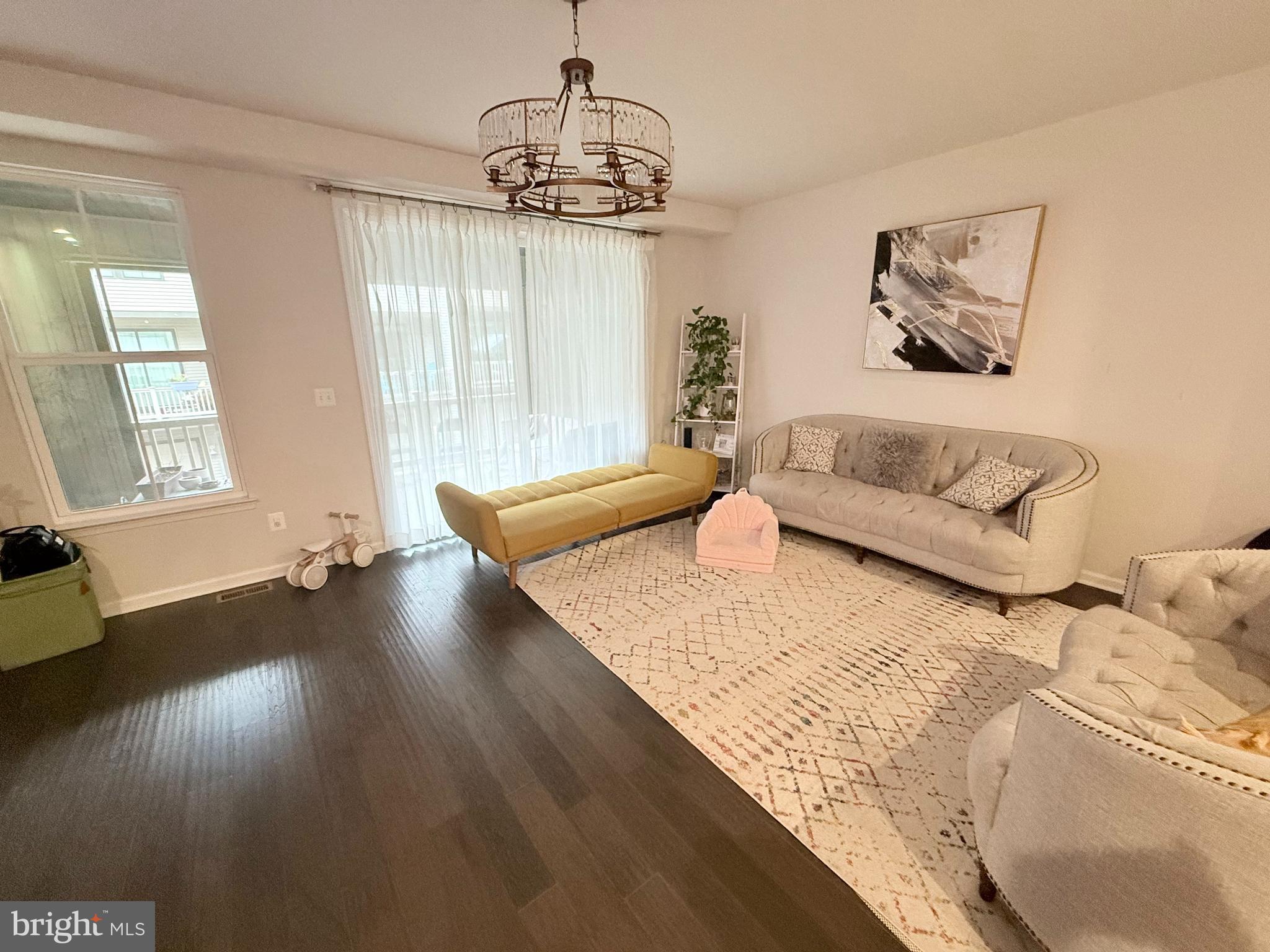 22269 Sims Terrace Ashburn, VA 20148 - Photo 22 of 44 a living room with furniture and wooden floor