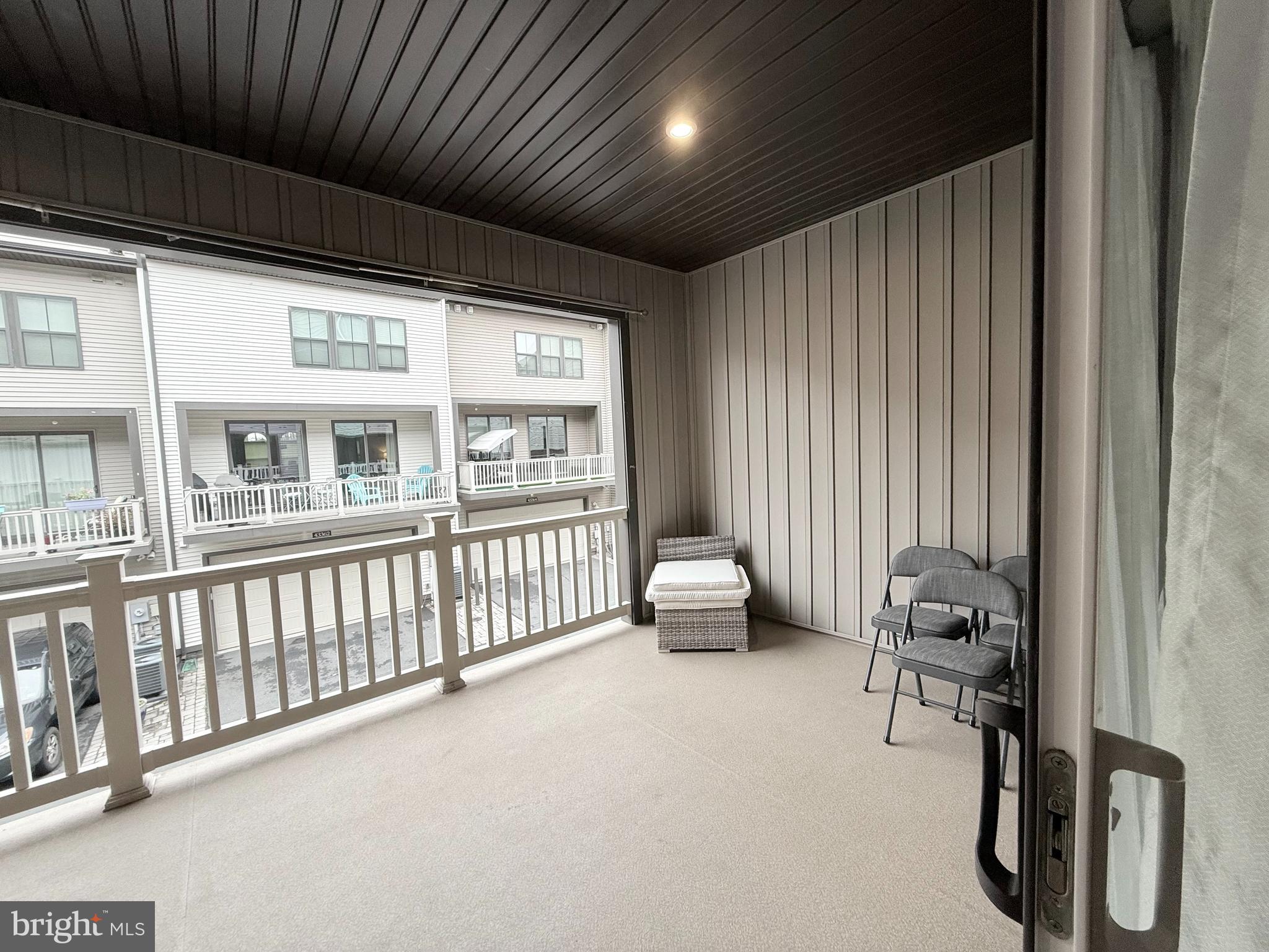 22269 Sims Terrace Ashburn, VA 20148 - Photo 23 of 44 a living room with furniture and a large window