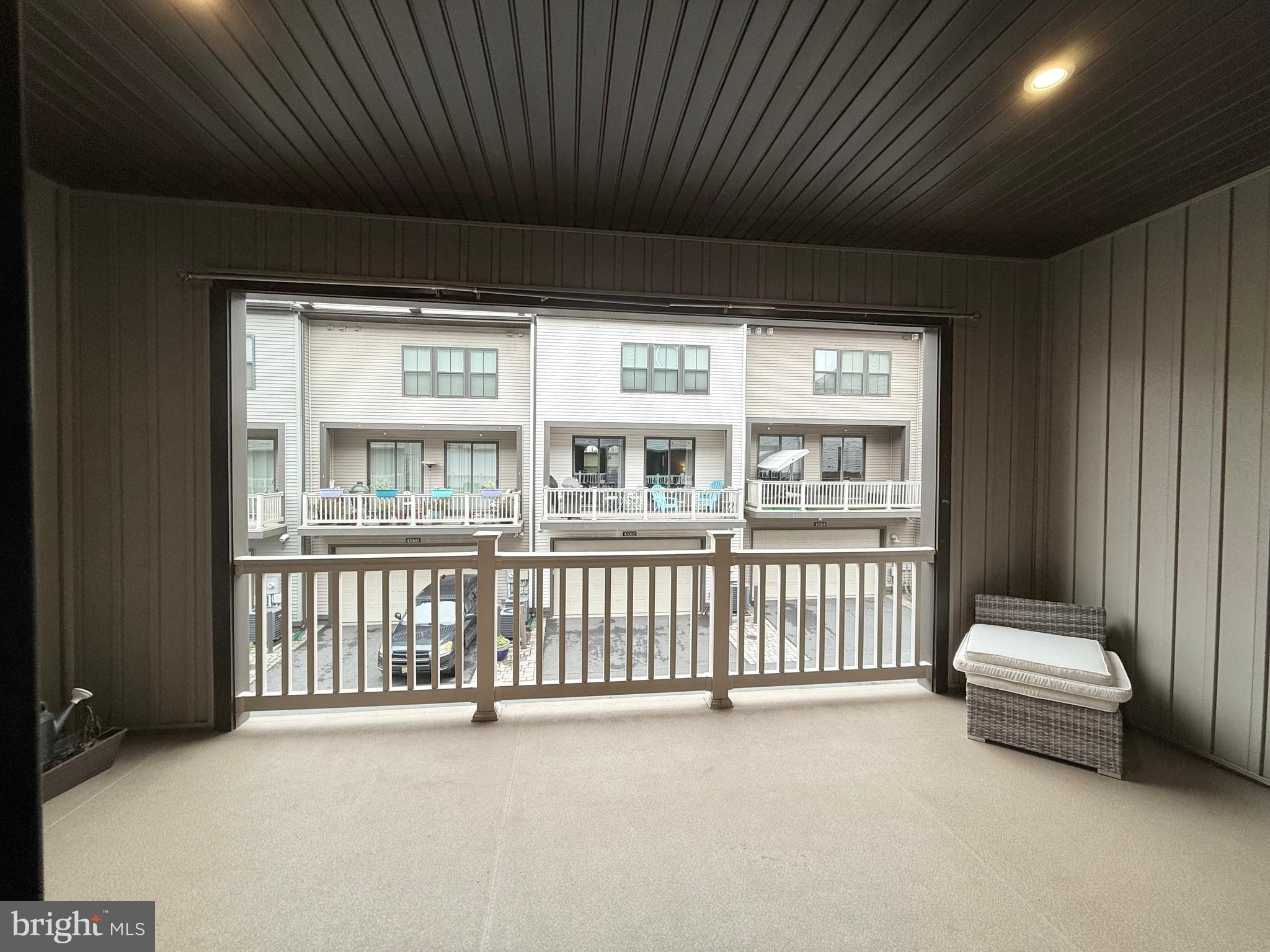 22269 Sims Terrace Ashburn, VA 20148 - Photo 26 of 44 a view of a balcony with furniture