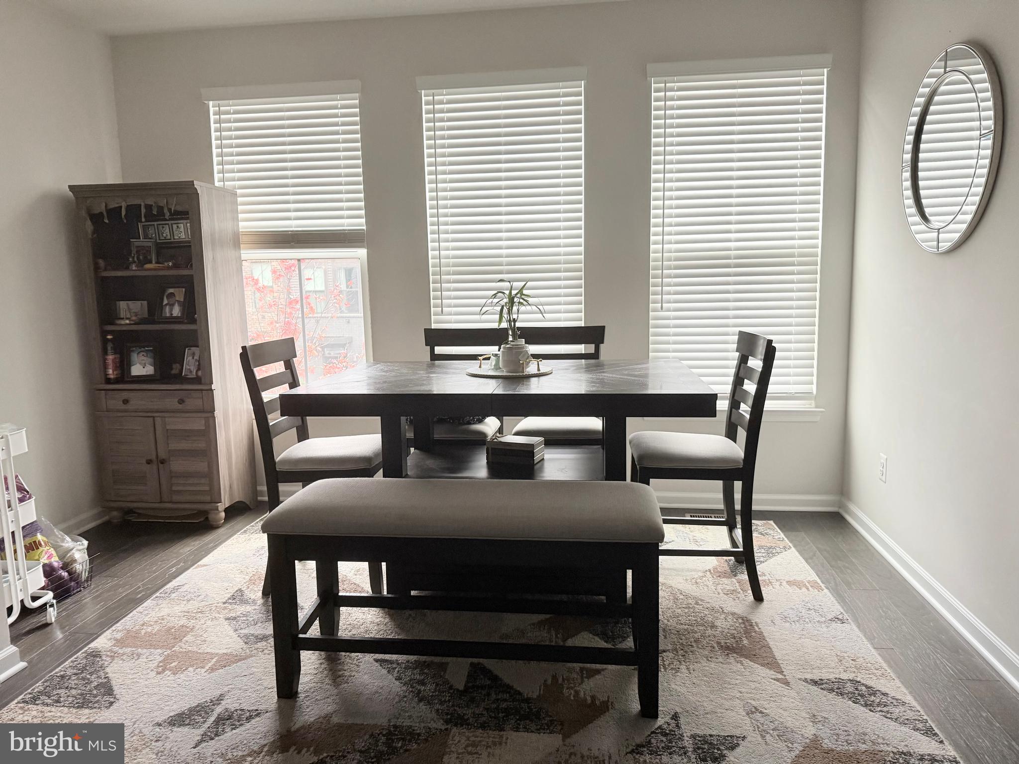 22269 Sims Terrace Ashburn, VA 20148 - Photo 36 of 44 a dining room with furniture and window