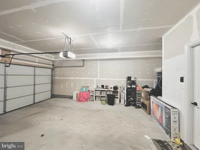 a view of a garage with storage