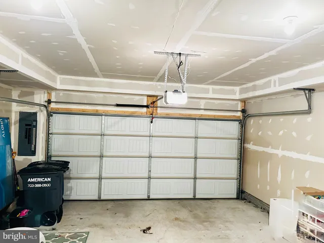 a room with lots of wooden cabinets