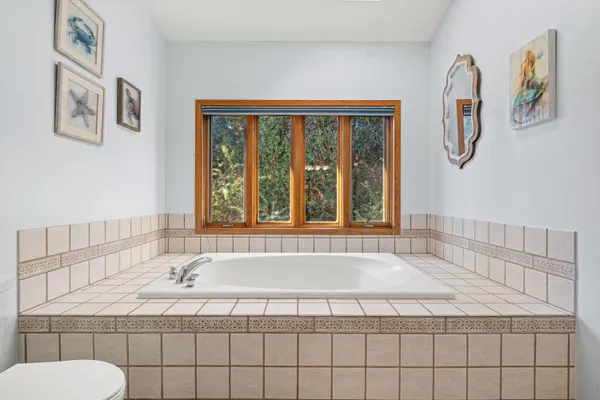 $1,175,000 | 5740 Woodland Hills Drive, Mount Pleasant, WI 53406