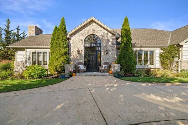 $1,175,000 | 5740 Woodland Hills Drive, Mount Pleasant, WI 53406
