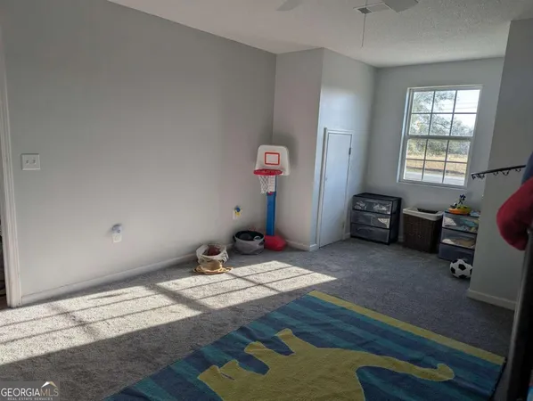 a view of a livingroom with wooden floor