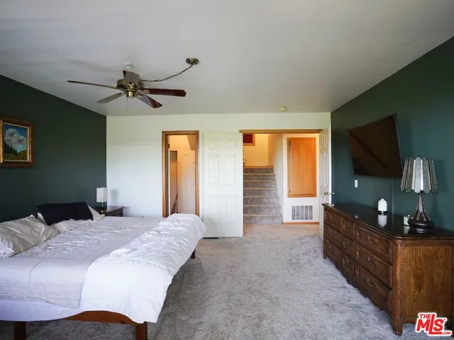 a balcony with wooden floor and outdoor space