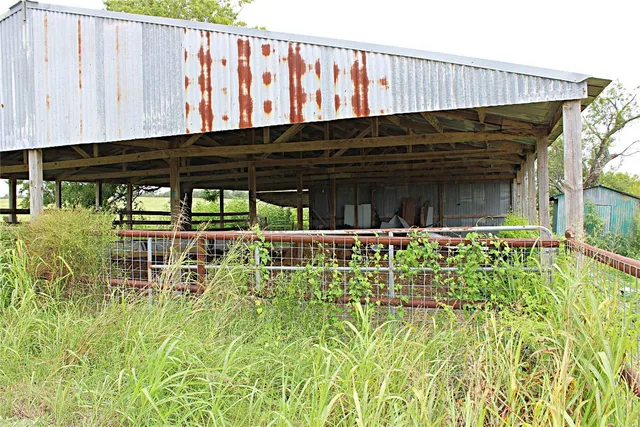 a view of swimming pool with outdoor seating