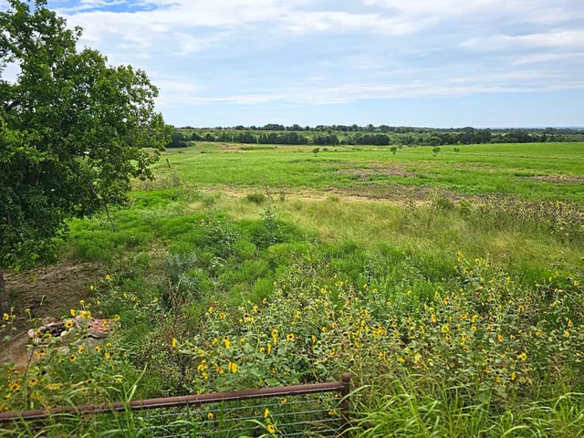 a view of an outdoor space and a lake view