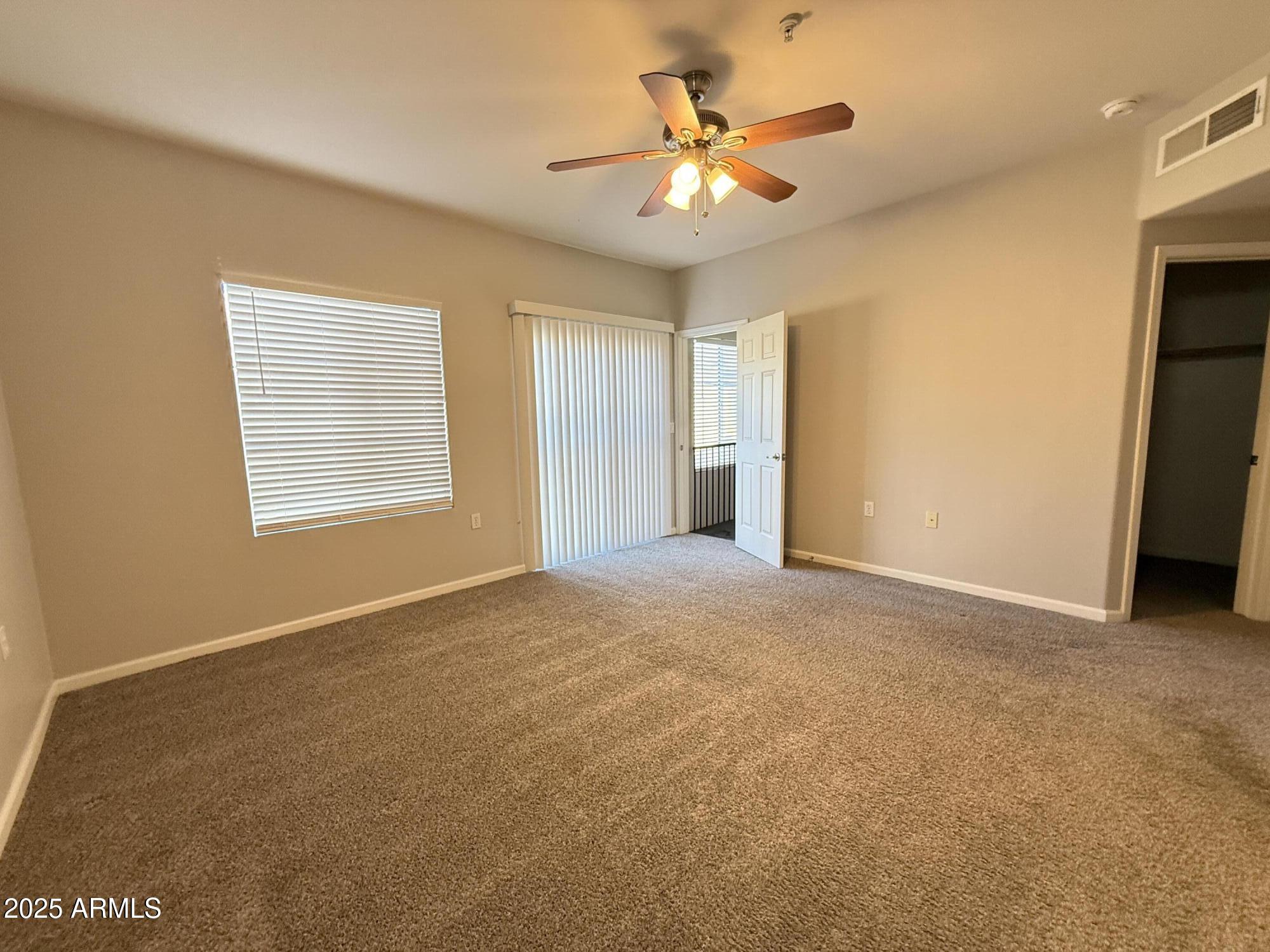 1920 East Bell Road, Unit 1149 Phoenix, AZ 85022 - Photo 26 of 33 a view of a livingroom with a chandelier