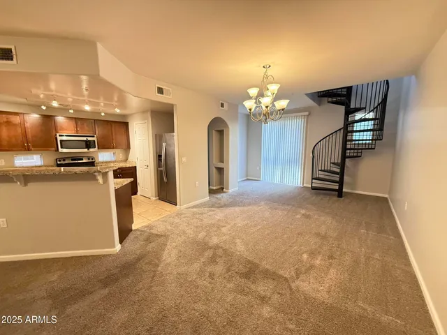 a view of a kitchen with a sink